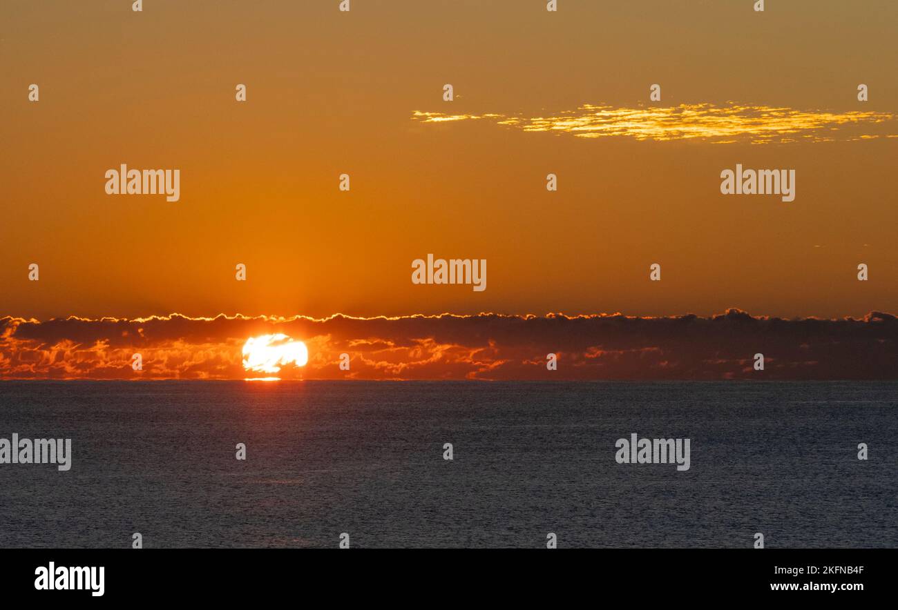 Sunrise through clouds, Atlantic Ocean, Myrtle Beach, SC Stock Photo