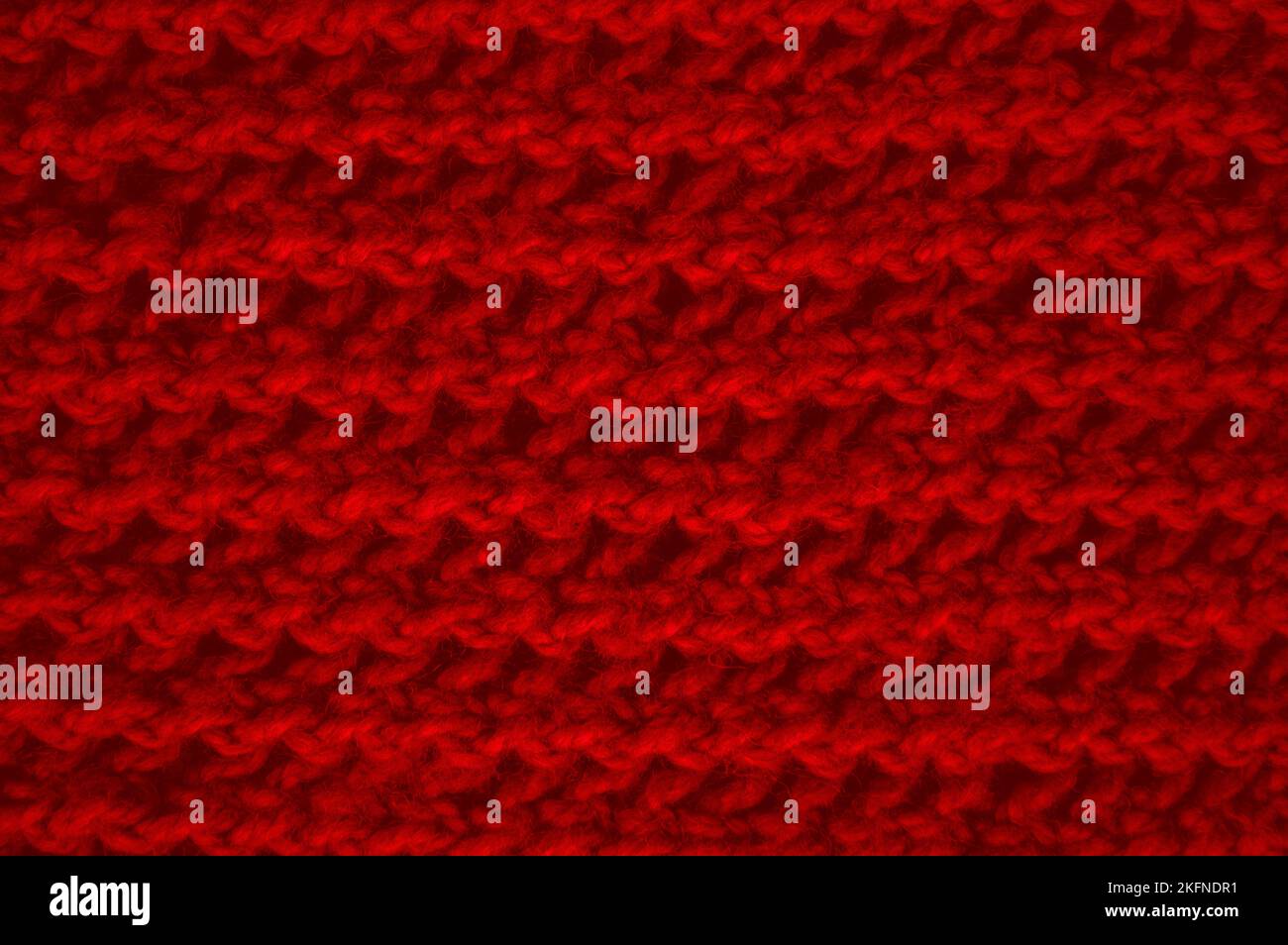Organic knitting background with macro wool threads. Stock Photo