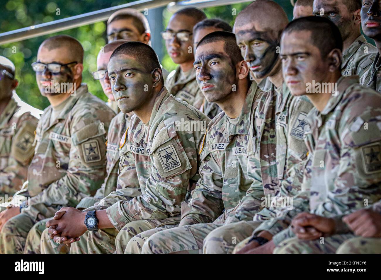 Soldiers with E Company, 2nd Battalion, 58th Infantry Regiment, listen