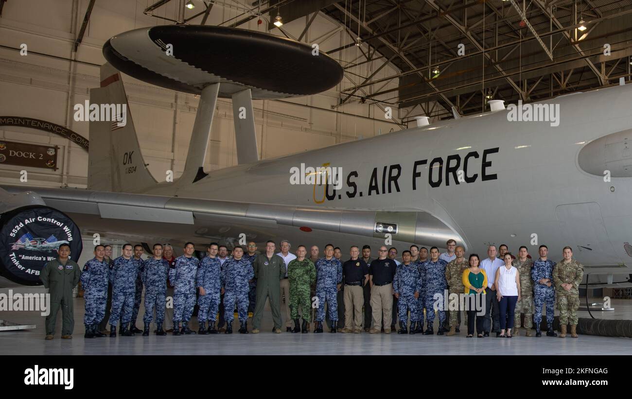 Members of the U.S. Air Force; Mexican Military; and other participants in the Amalgam Eagle 22 exercise pose for a group photo in front of an E-3 Sentry aircraft at Tinker Air Force Base, Oklahoma, Sept. 28, 2022. The 552nd Air Control Wing will be participating in the live-fly exercise to be conducted along the U.S./Mexico border. Stock Photo