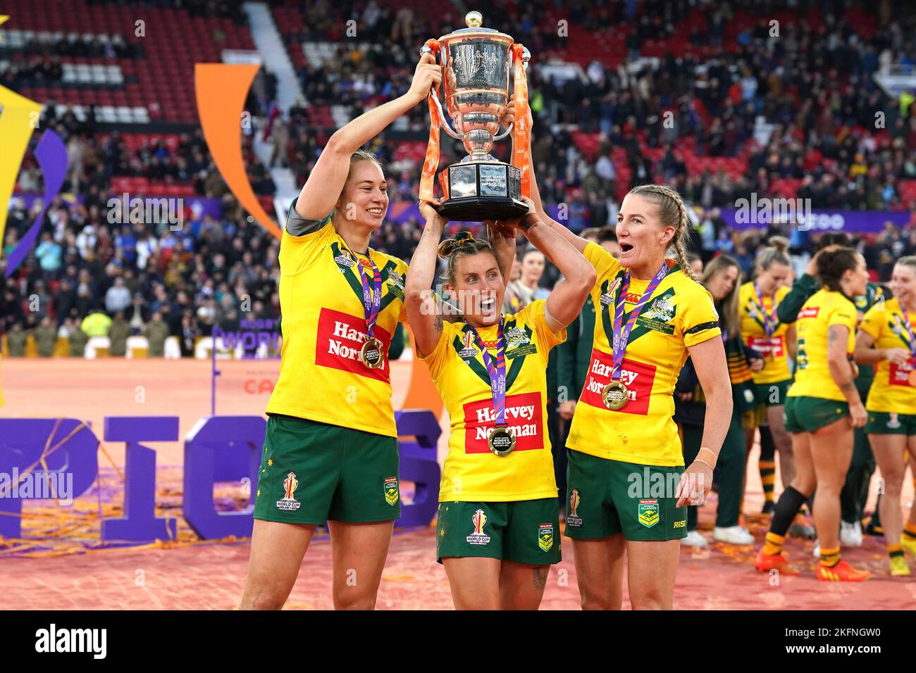 Australia's Samantha Bremner (centre), Kezie Apps (left) and Ali Brigginshaw celebrate with the trophy after victory the Women's Rugby League World Cup final at Old Trafford, Manchester. Picture date: Saturday November 19, 2022. Stock Photo