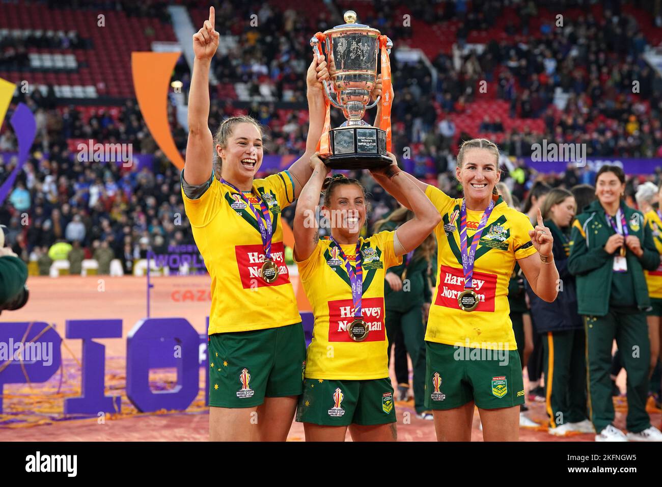 Australia's Samantha Bremner (centre), Kezie Apps (left) and Ali Brigginshaw celebrate with the trophy after victory the Women's Rugby League World Cup final at Old Trafford, Manchester. Picture date: Saturday November 19, 2022. Stock Photo