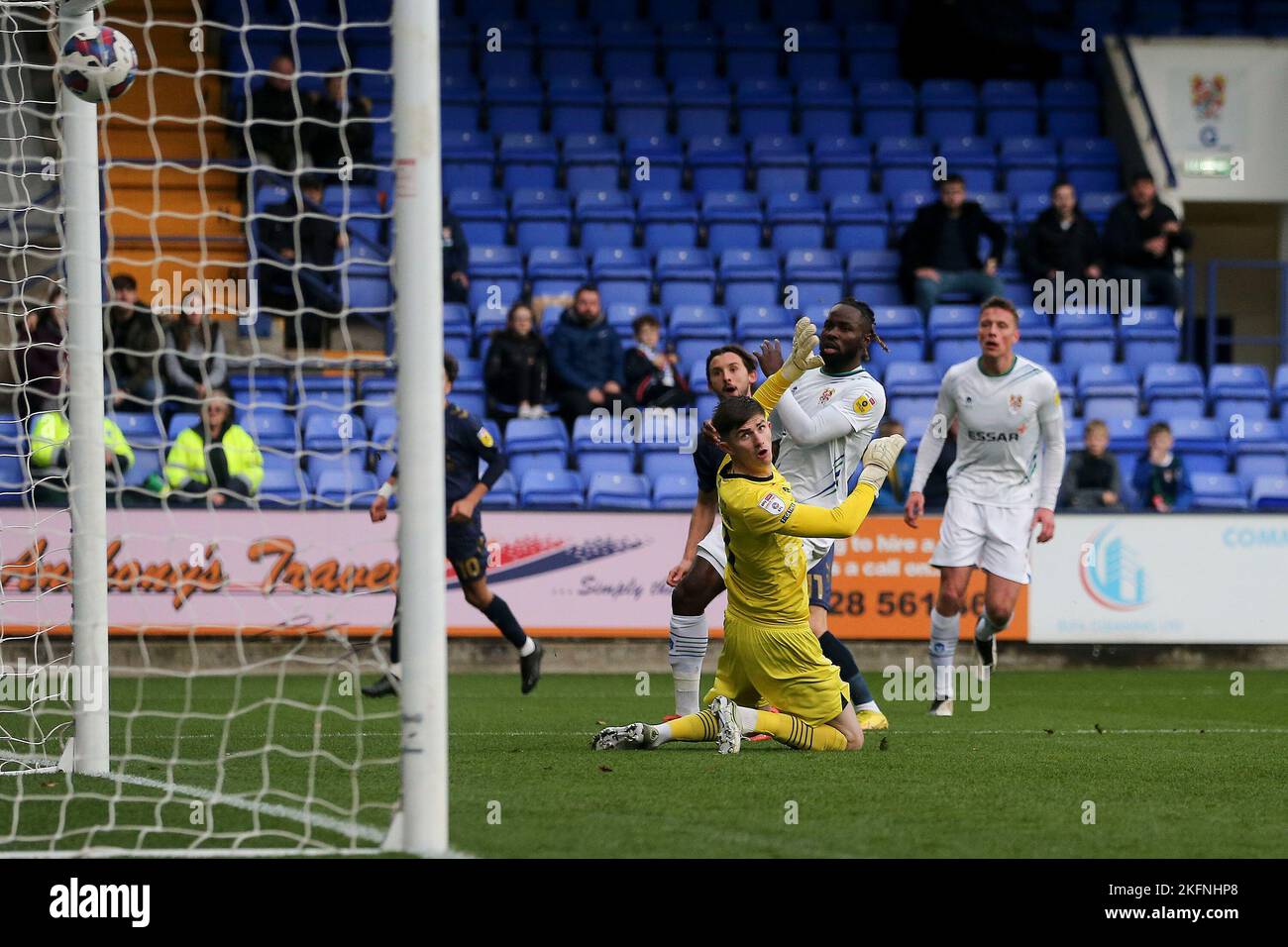 Birkenhead, UK. 19th Nov, 2022. Ethan Chislett of AFC Wimbledon (c) shoots and scores his teams 1st goal. EFL Skybet Football league two match, Tranmere Rovers v AFC Wimbledon at Prenton Park, Birkenhead, Wirral on Saturday 19th November 2022. this image may only be used for Editorial purposes. Editorial use only, license required for commercial use. No use in betting, games or a single club/league/player publications.pic by Chris Stading/Andrew Orchard sports photography/Alamy Live News Credit: Andrew Orchard sports photography/Alamy Live News Stock Photo
