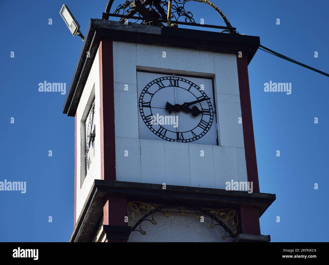 Close up shot of a clock tower. Clock towers were invented in the 11th