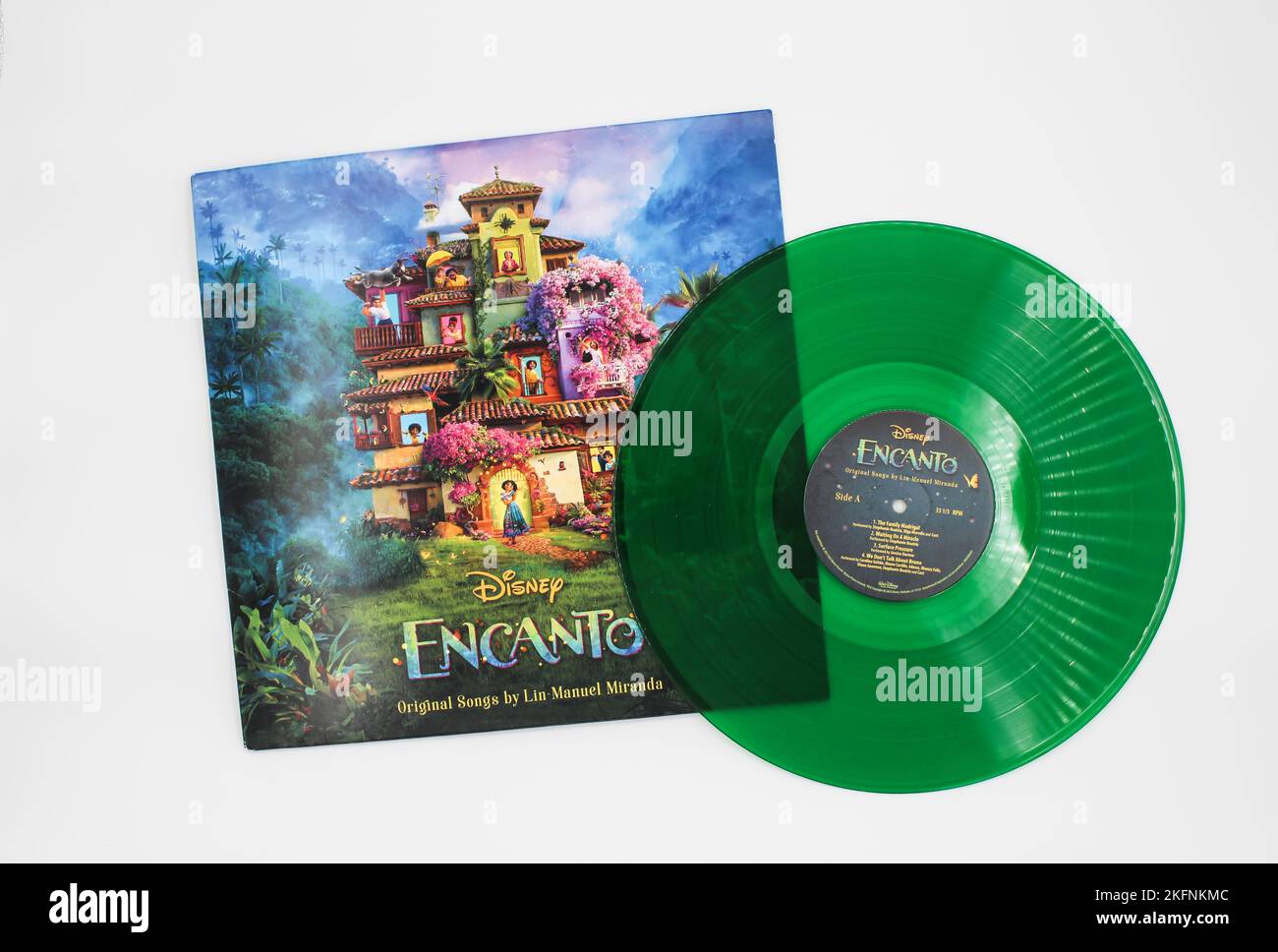 Encanto is the soundtrack album to Disney's 2021 film. Green vinyl record with partial album cover. Stock Photo