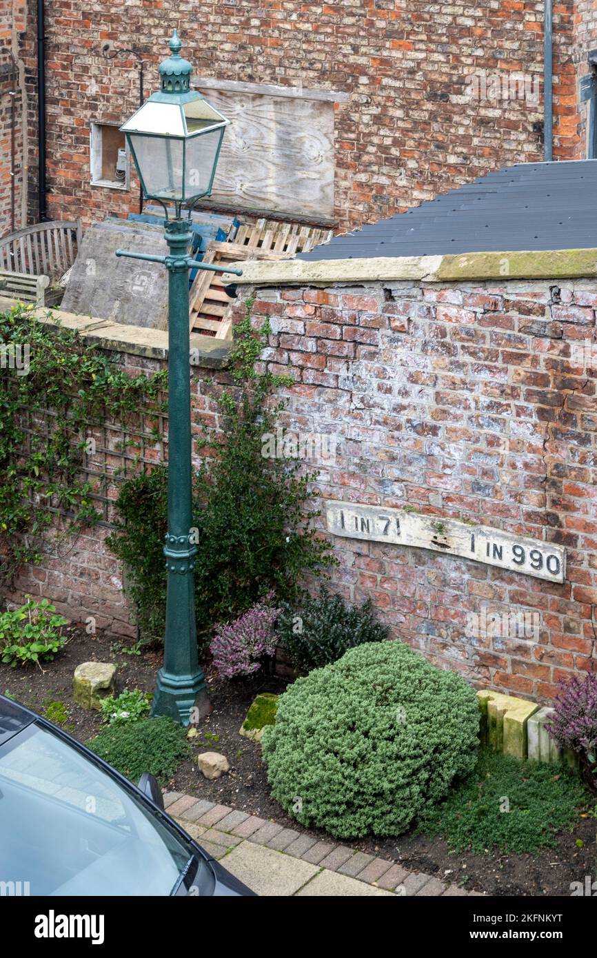 Close up of a garden with old street lamp Stock Photo