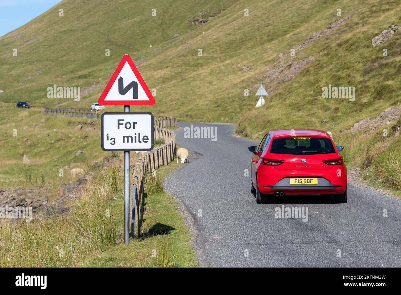 Windy Road Ahead sign on a moorland road in the Scottish Borders, UK