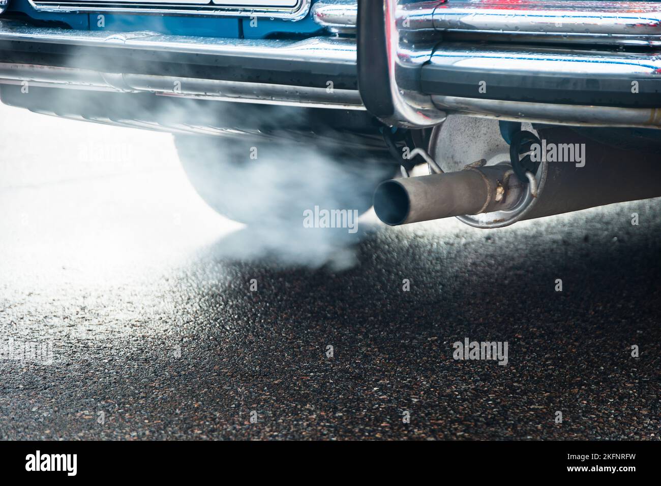 combustion fumes coming out of car exhaust pipe, exhaust gas from a car with diesel or gasoline engine Stock Photo