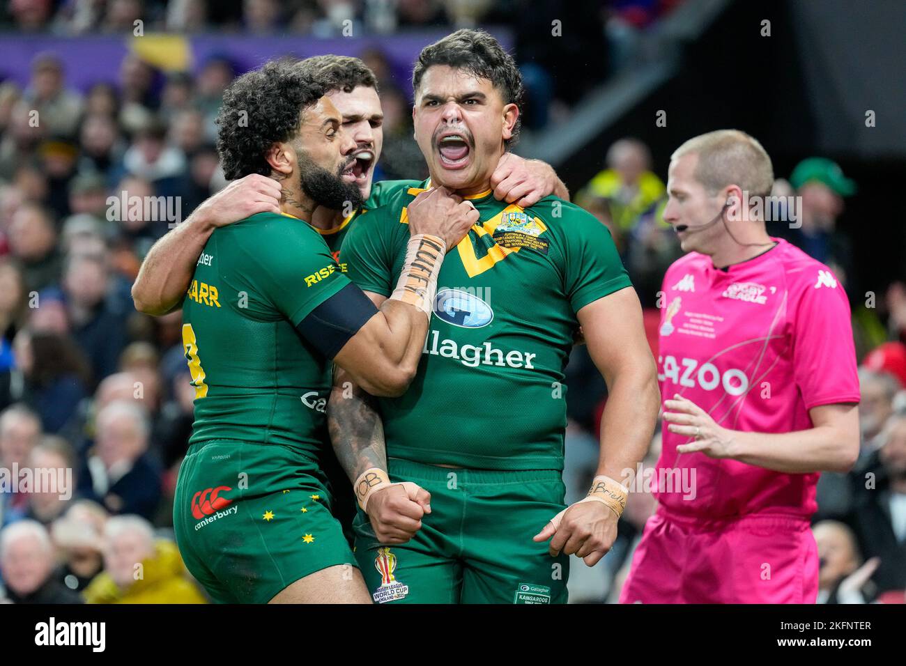 Manchester, UK. 18th Nov, 2022. Latrell Mitchell (South Sydney Rabbitohs) of Australia (8) (right) celebrates with Josh Addo-Carr (Canterbury Bankstown Bulldogs) and Nathan Cleary (Penrith Panthers) after he scores the opening try during the 2021 Rugby League World Cup Final 2021 match between Australia and Samoa at Old Trafford, Manchester, England on 19 November 2022. Photo by David Horn. Credit: PRiME Media Images/Alamy Live News Stock Photo