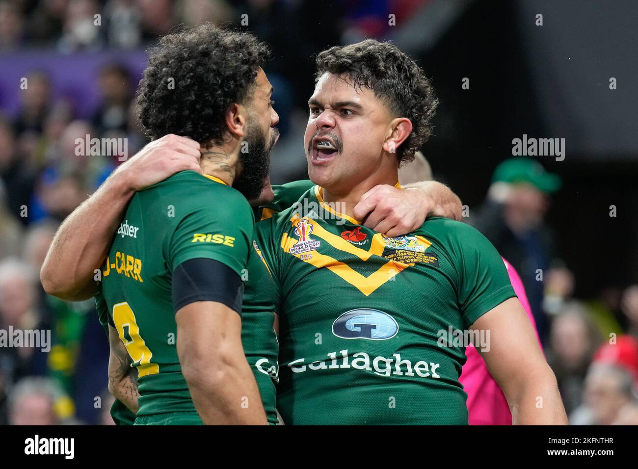 Manchester, UK. 18th Nov, 2022. Latrell Mitchell (South Sydney Rabbitohs) of Australia (8) (right) celebrates with Josh Addo-Carr (Canterbury Bankstown Bulldogs) and Nathan Cleary (Penrith Panthers) after he scores the opening try during the 2021 Rugby League World Cup Final 2021 match between Australia and Samoa at Old Trafford, Manchester, England on 19 November 2022. Photo by David Horn. Credit: PRiME Media Images/Alamy Live News Stock Photo