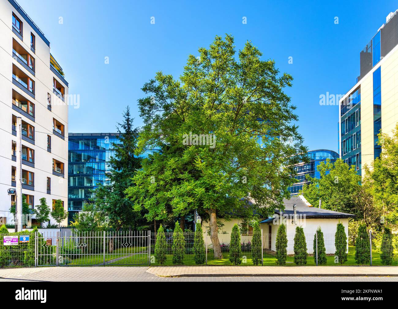 Warsaw, Poland June 26, 2022 Vintage village house and yard squeezed