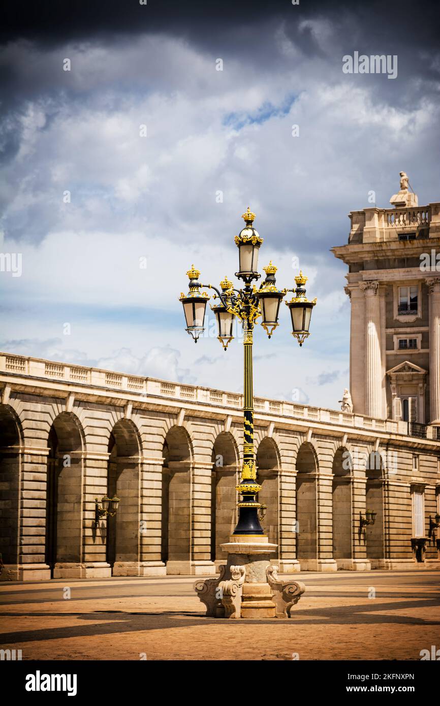 Lamppost decorated in gold in the parade ground of the royal palace of Madrid Stock Photo