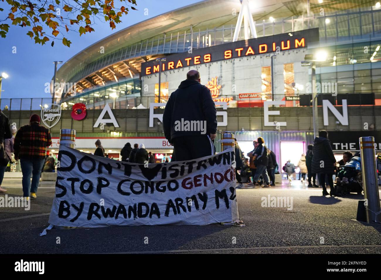 London Riot Rwandan A banner protesting against the Rwandan army is seen outside the ground ...
