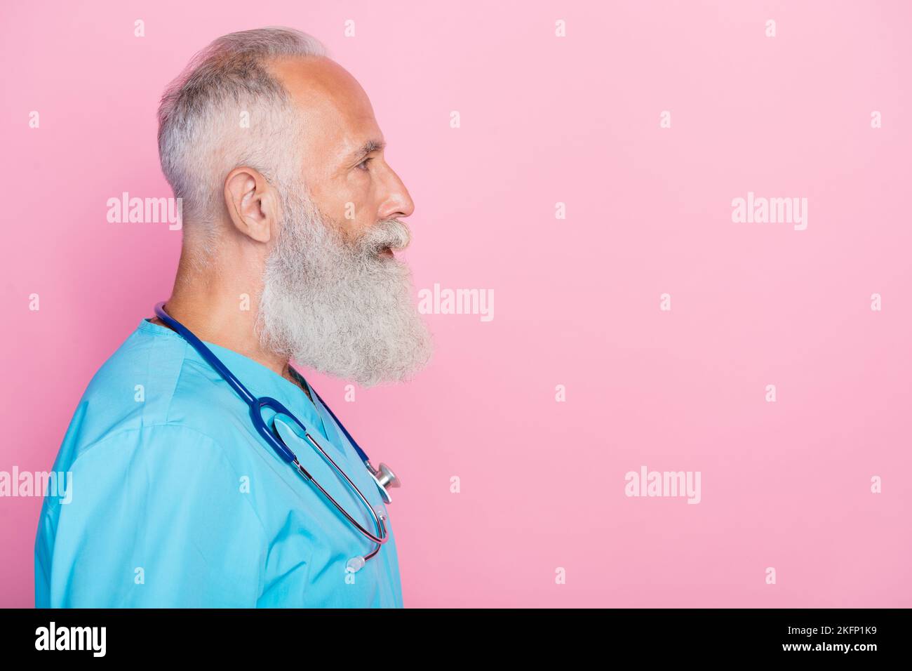 Profile side photo of professional cardiologist listen patient examine health empty space isolated on pastel color background Stock Photo