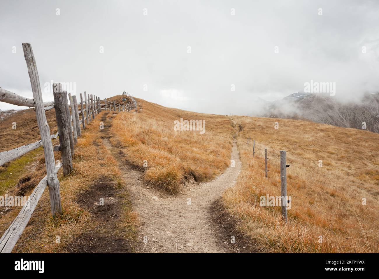 Path fence funes valley hi-res stock photography and images - Alamy