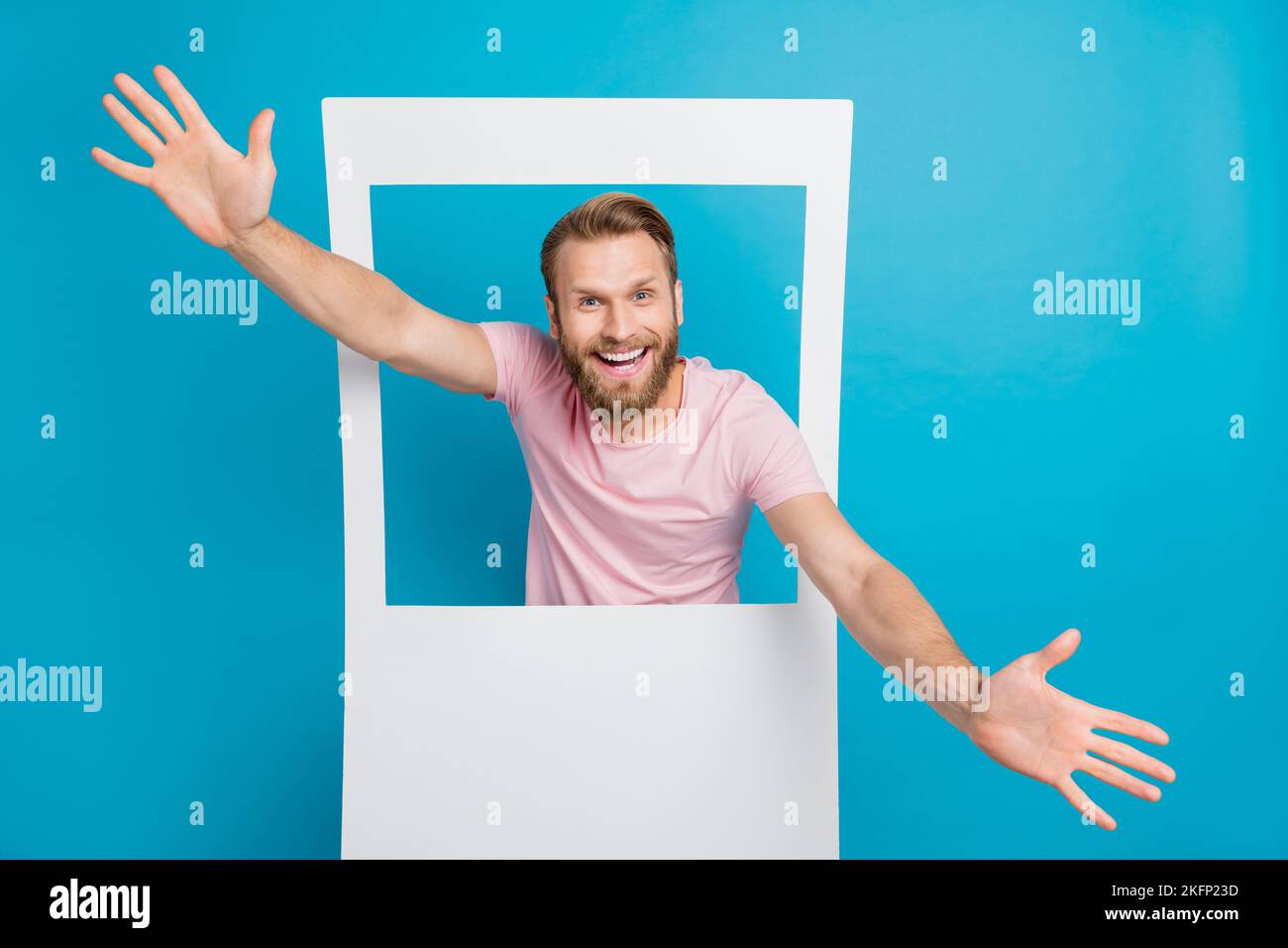 Photo portrait of nice young man model instant photo frame hands ...