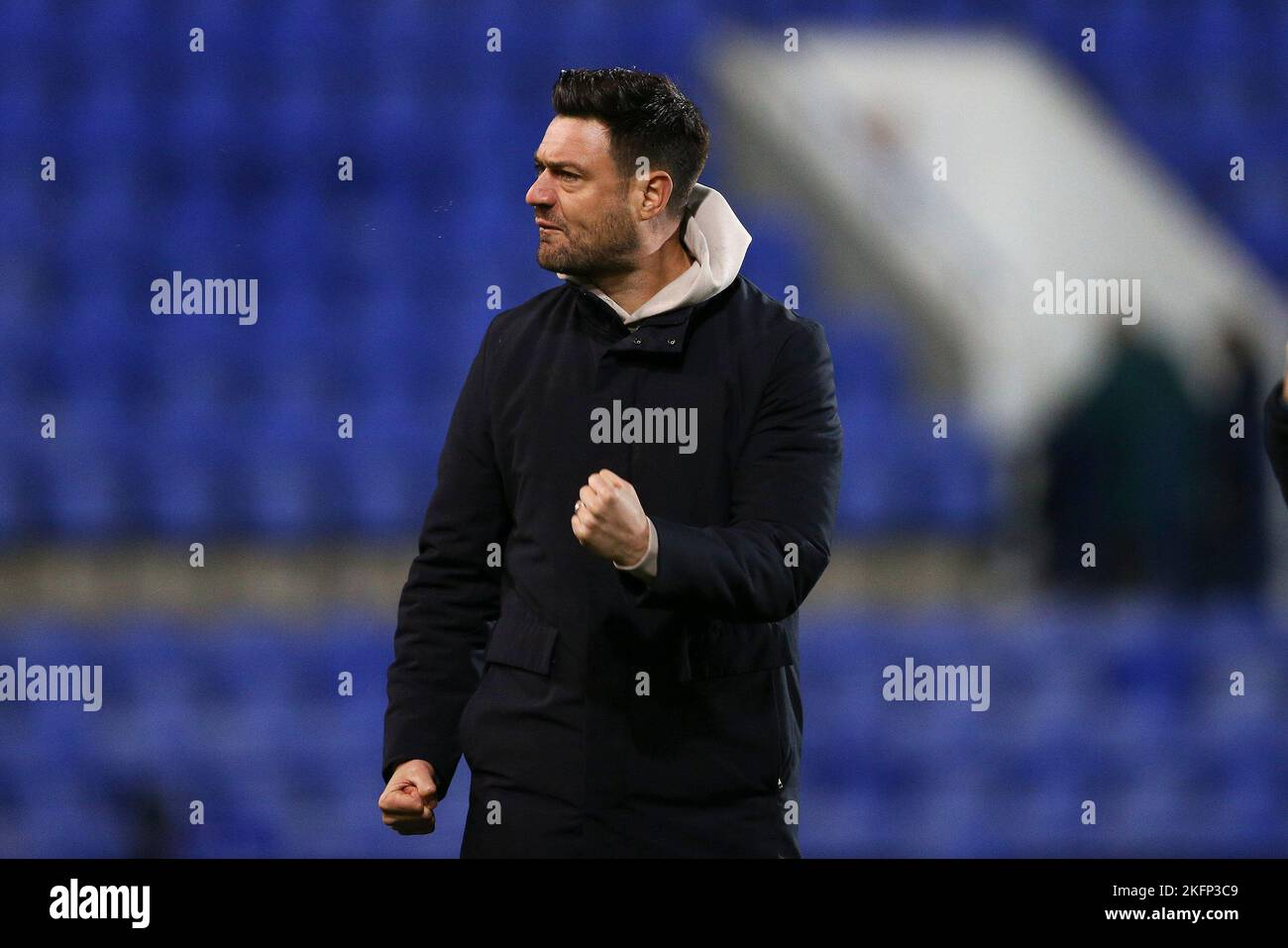 Birkenhead, UK. 19th Nov, 2022. Johnnie Jackson, the manager of AFC Wimbledon shows his appreciation to the fans at the end on the game. EFL Skybet Football league two match, Tranmere Rovers v AFC Wimbledon at Prenton Park, Birkenhead, Wirral on Saturday 19th November 2022. this image may only be used for Editorial purposes. Editorial use only, license required for commercial use. No use in betting, games or a single club/league/player publications.pic by Chris Stading/Andrew Orchard sports photography/Alamy Live News Credit: Andrew Orchard sports photography/Alamy Live News Stock Photo