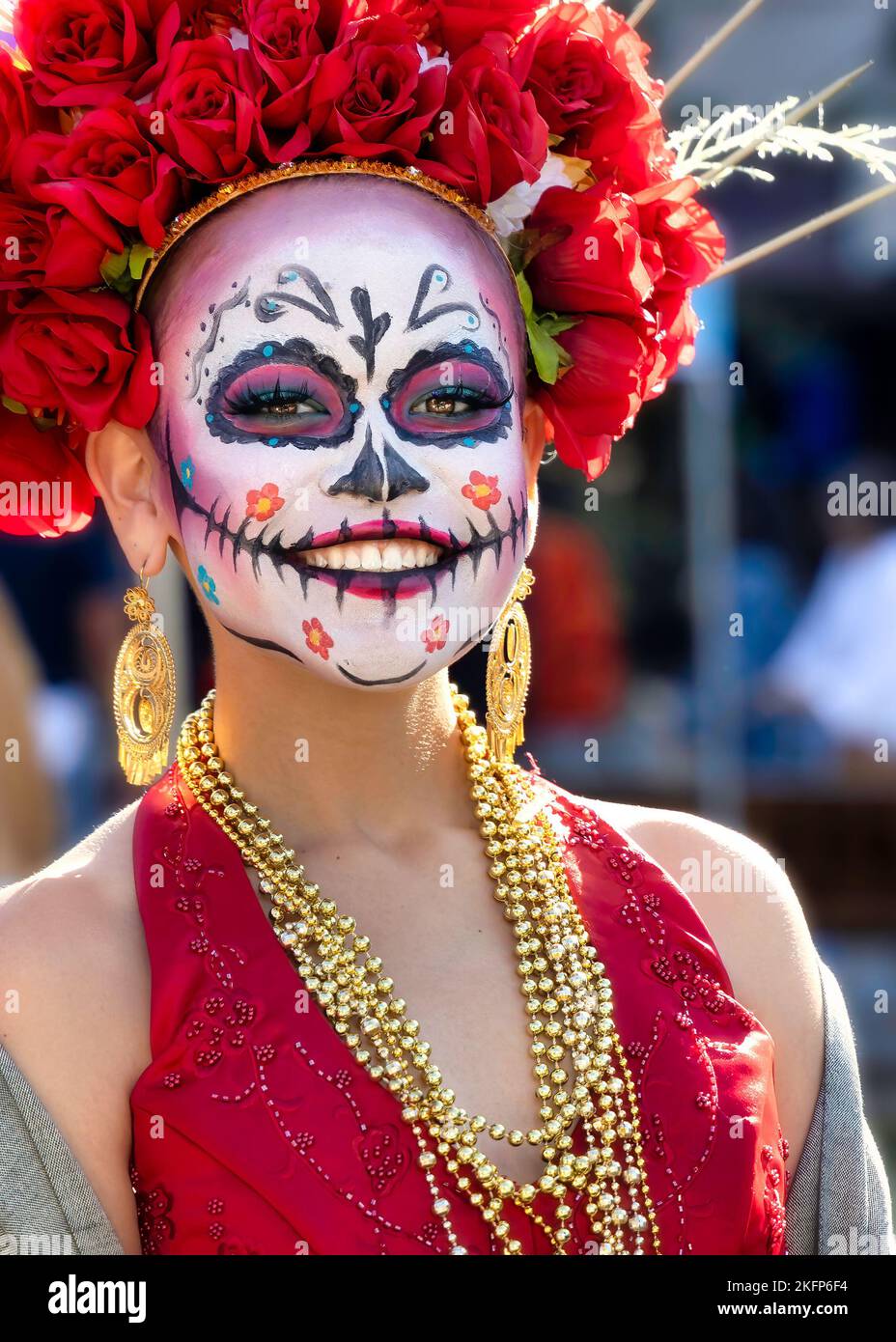 A woman smiles at the 2022 Day of the Dead Festival and Parade in downtownb El Paso, Texas. Stock Photo