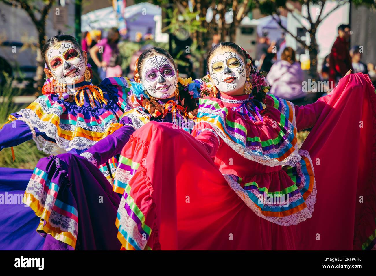 A group of women, wearing traditional Mexican costumes, at the 2022 Day of the Dead Festival and Parade in downtownb El Paso, Texas. Stock Photo