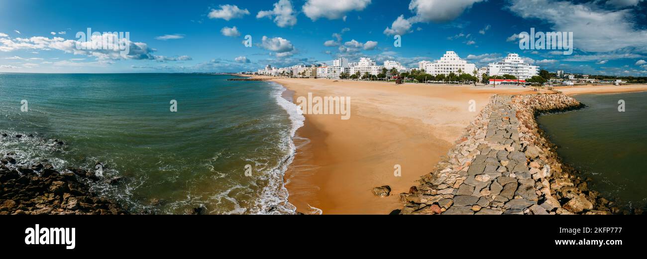 Beautiful aerial panorama of Portuguese city of Quarteira, Algarve, Portugal, a popular summer resort destination in the south of Portugal Stock Photo