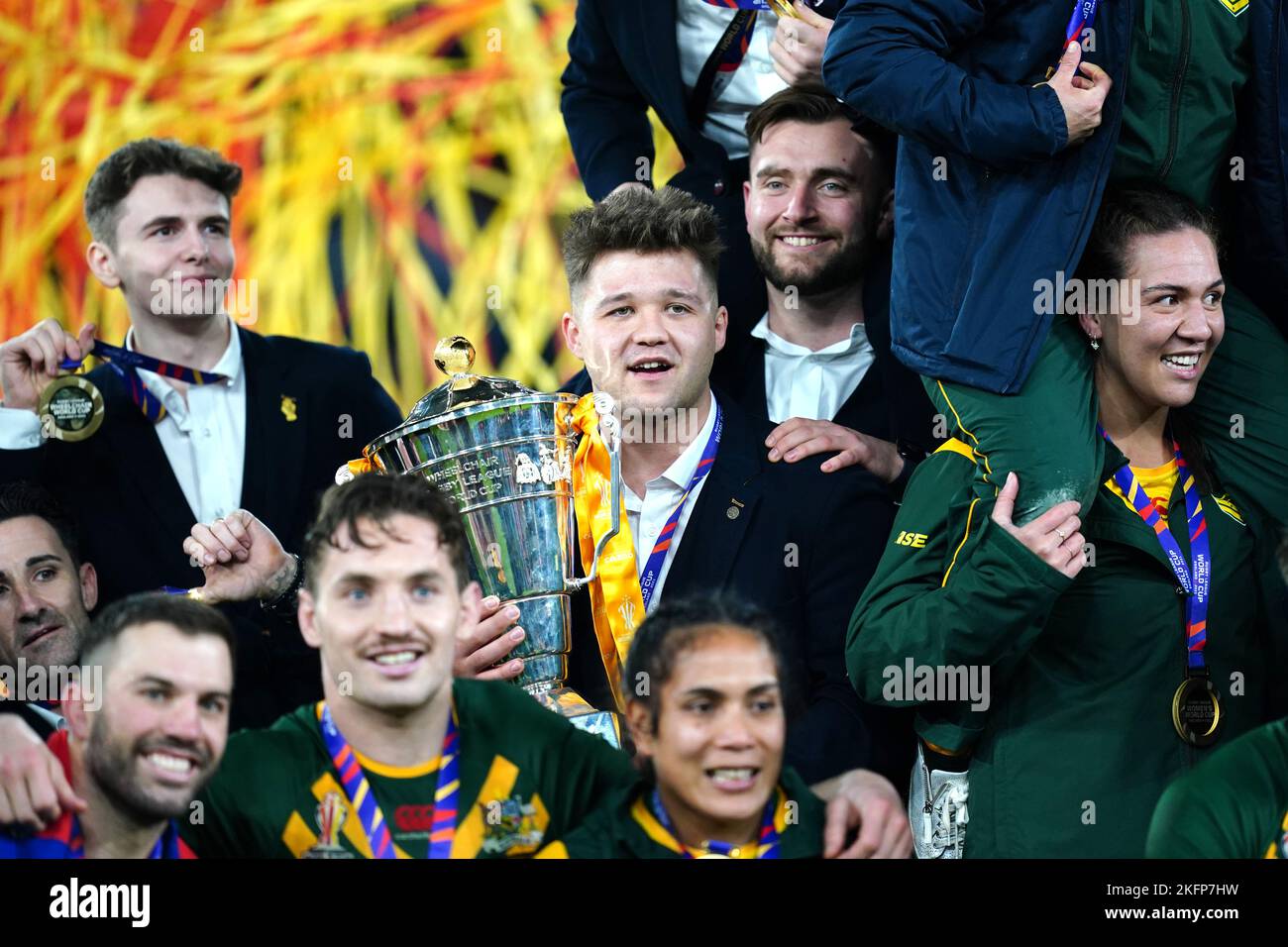 England's Tom Halliwell (centre) with the trophy for Wheelchair rugby following the Rugby League World Cup final at Old Trafford, Manchester. Picture date: Saturday November 19, 2022. Stock Photo