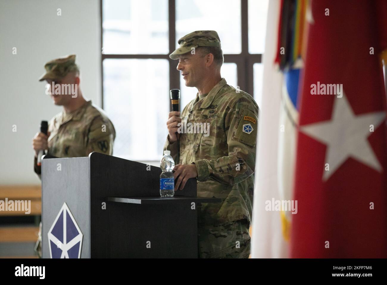 U.S. Army Lt. John S. Kolasheski, commanding general of V Corps, delivers remarks officially welcoming his newest deputy commanding general for maneuver, U.S. Army Maj. Gen. David B. Womack, at the Victory Honors Ceremony at Camp Kosciuszko, Poznan, Poland, Sept. 30, 2022. Womack becomes the first deputy commanding general to join V Corps—the American command and control army element in the European Theater—in Poland since the base renaming to Camp Kosciuszko. V Corps works alongside NATO allies and regional security partners to provide combat-ready forces, executes joint and multinational tra Stock Photo