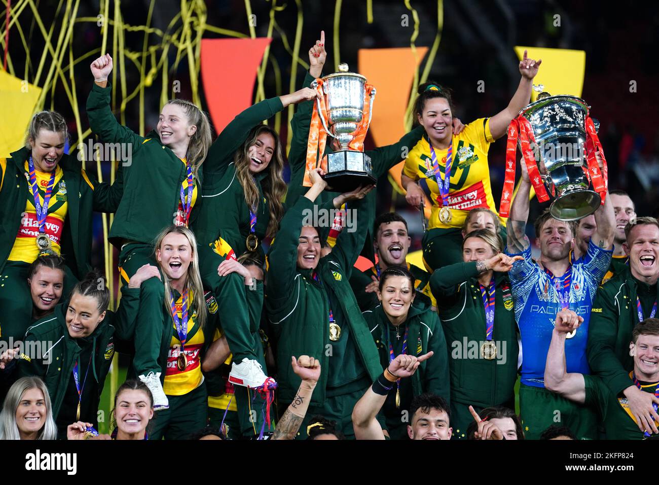 Australia men and women players celebrate with their respective
