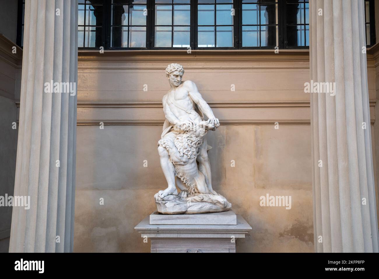 Giovanni Baratta's marble statue of Hercules in front of the Hercules Pavilion (Herkulespavillonen) in Rosenborg Castle Gardens, Copenhagen, Denmark. Stock Photo
