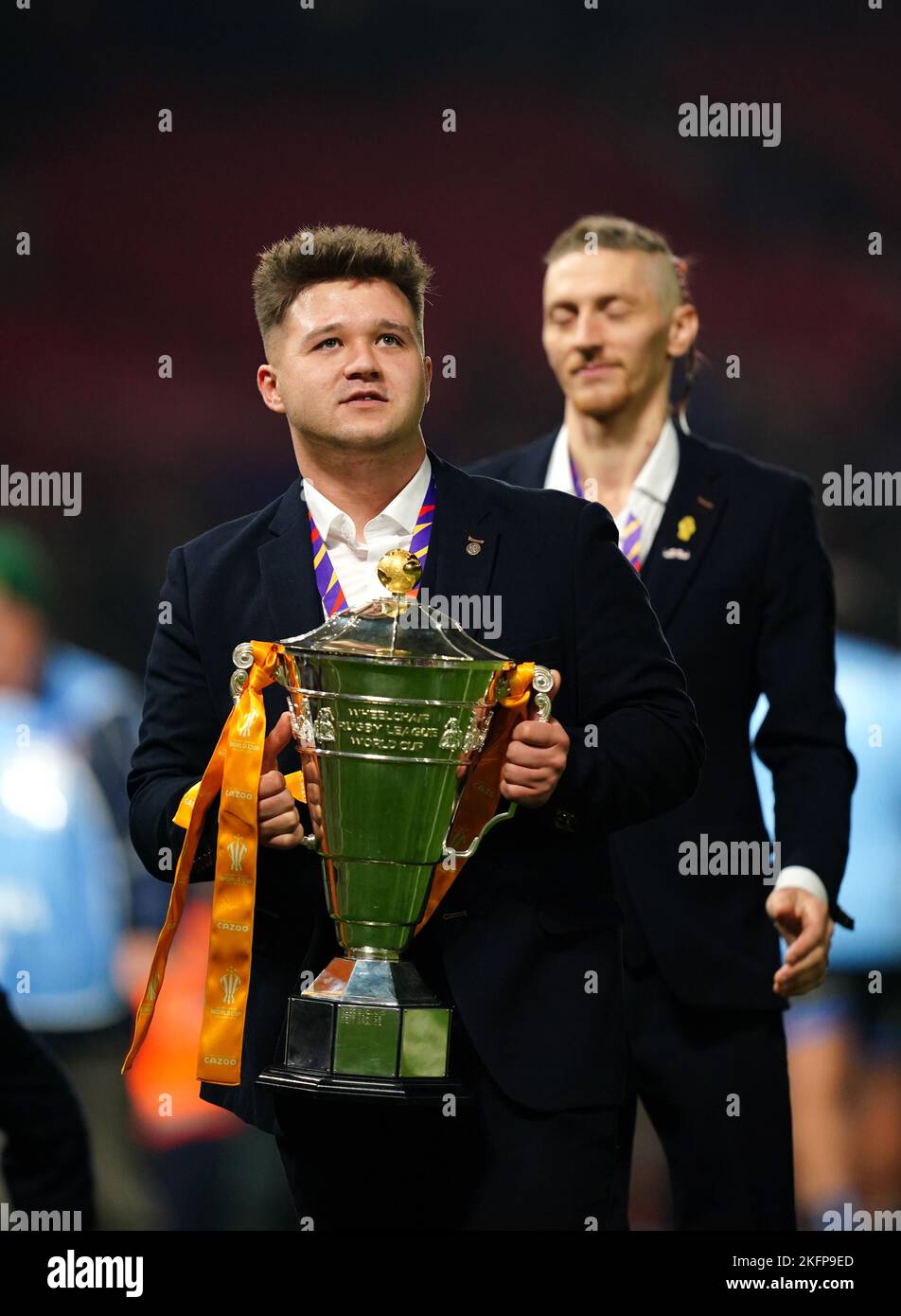 England's Tom Halliwell with the trophy for Wheelchair rugby following the Rugby League World Cup final at Old Trafford, Manchester. Picture date: Saturday November 19, 2022. Stock Photo