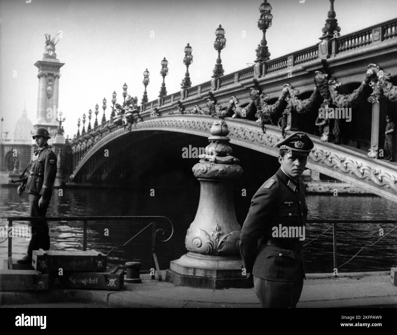 German Soldiers by Bridge in Paris in IS PARIS BURNING ? 1966 director RENE CLEMENT book Larry Collins and Dominique Lapierre screenplay Gore Vidal and Francis Ford Coppola music Maurice Jarre France-USA co-production Marianne Productions / Transcontinental Films / Paramount Pictures Stock Photo
