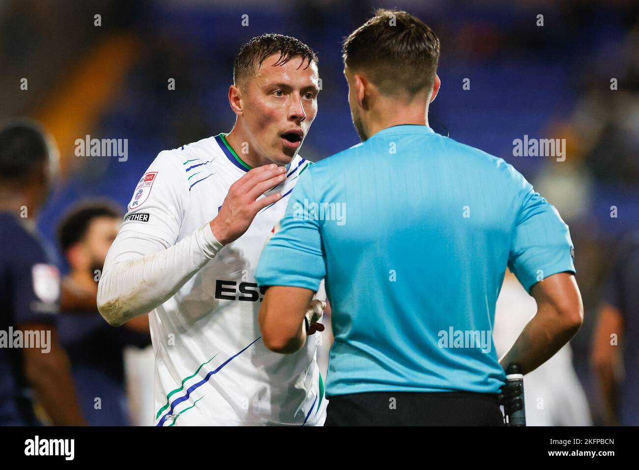 Tom Davies #5 of Tranmere Rovers gestures towards referee Thomas Kirk during the Sky Bet League 2 match Tranmere Rovers vs AFC Wimbledon at Prenton Park, Birkenhead, United Kingdom, 19th November 2022  (Photo by Phil Bryan/News Images) Stock Photo