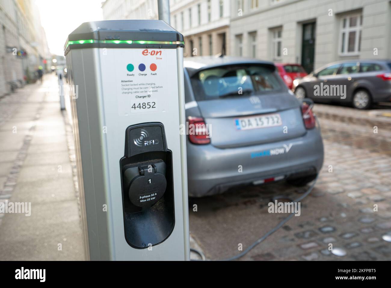 Electric car charging point A Fiat 500 car recharging its battery at