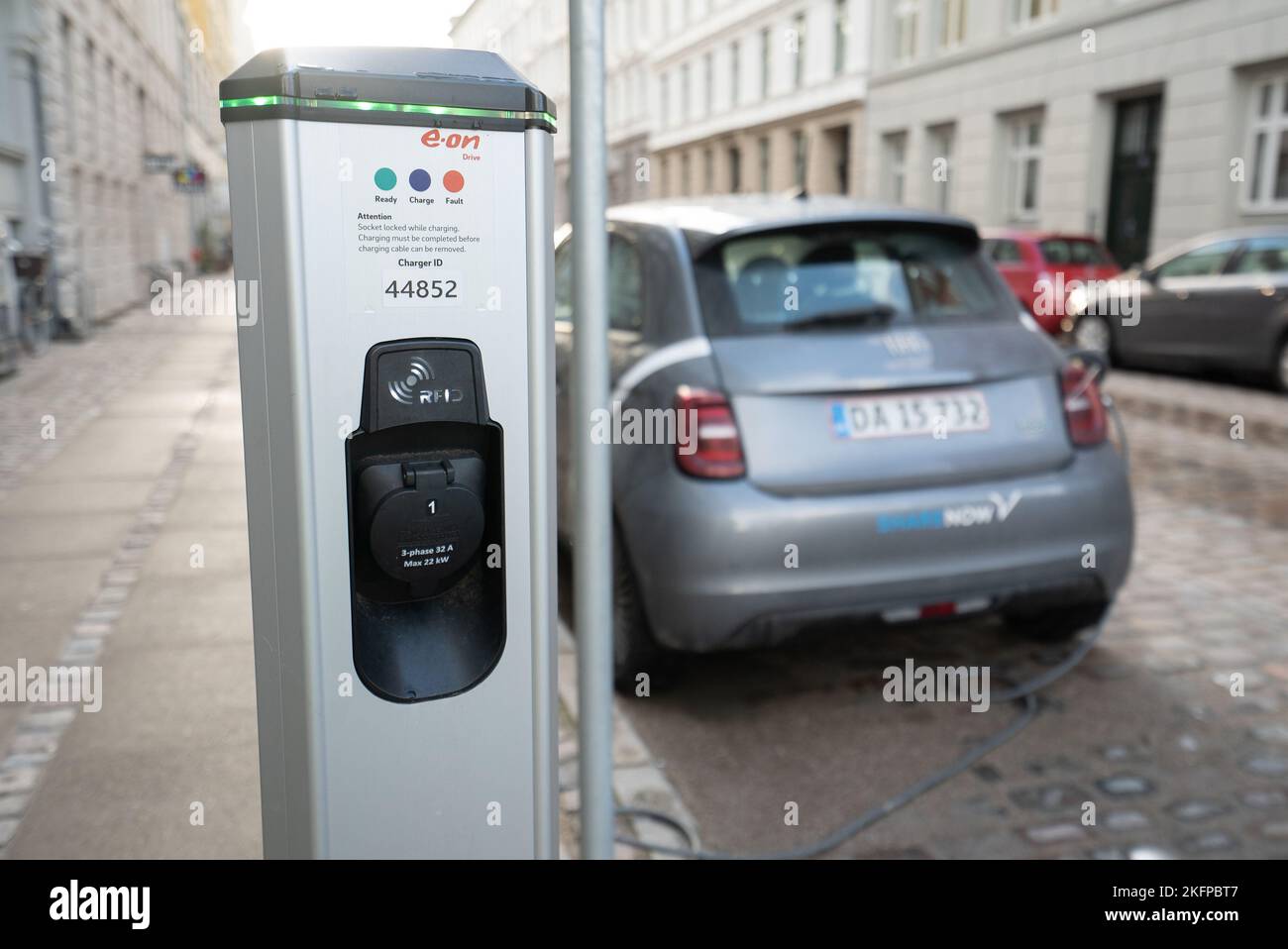 Electric car charging point A Fiat 500 car recharging its battery at