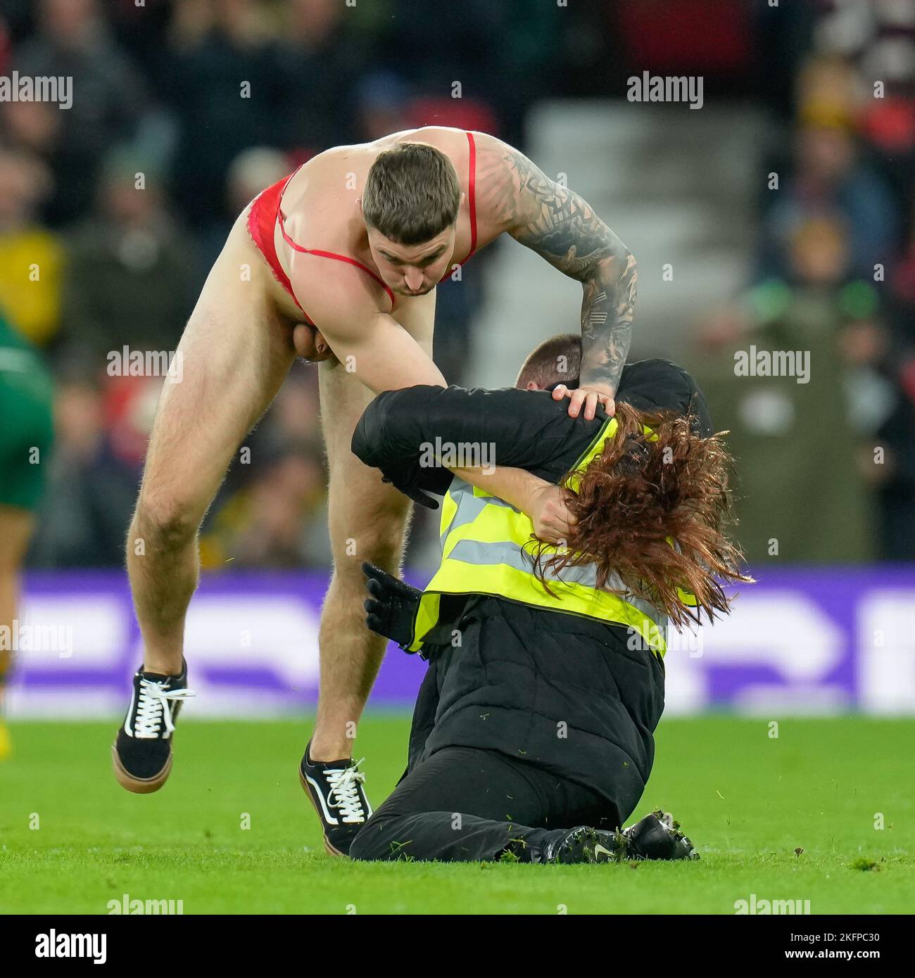 Manchester, UK. 18th Nov, 2022. A streaker during the 2021 Rugby League World Cup Final 2021 match between Australia and Samoa at Old Trafford, Manchester, England on 19 November 2022. Photo by David Horn. Credit: PRiME Media Images/Alamy Live News Stock Photo