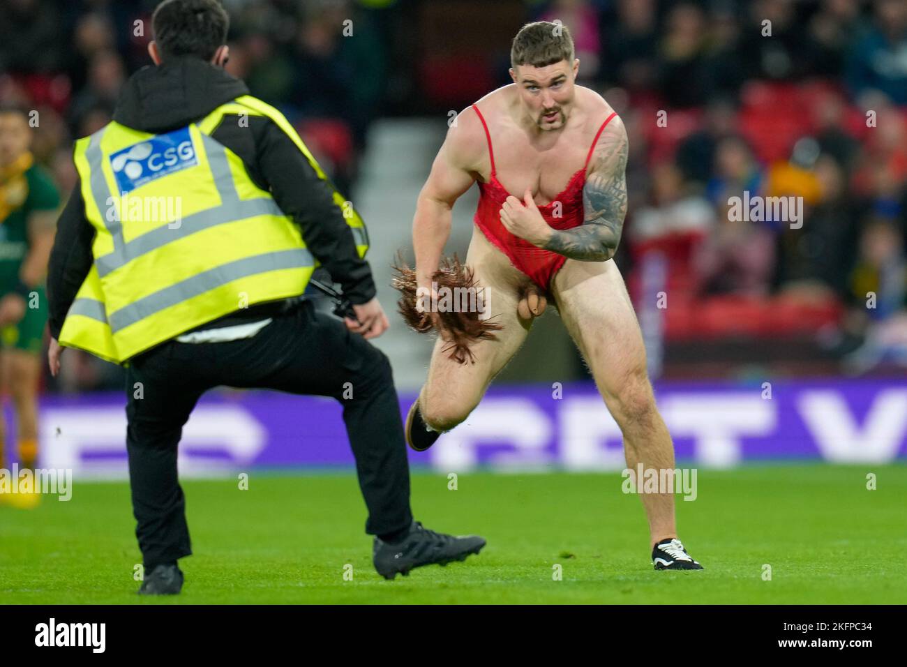Manchester, UK. 18th Nov, 2022. A streaker during the 2021 Rugby League World Cup Final 2021 match between Australia and Samoa at Old Trafford, Manchester, England on 19 November 2022. Photo by David Horn. Credit: PRiME Media Images/Alamy Live News Stock Photo
