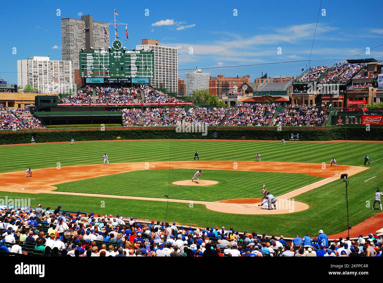 Fans enjoy a sunny summer day at the Friendly Confines of Wrigley Field