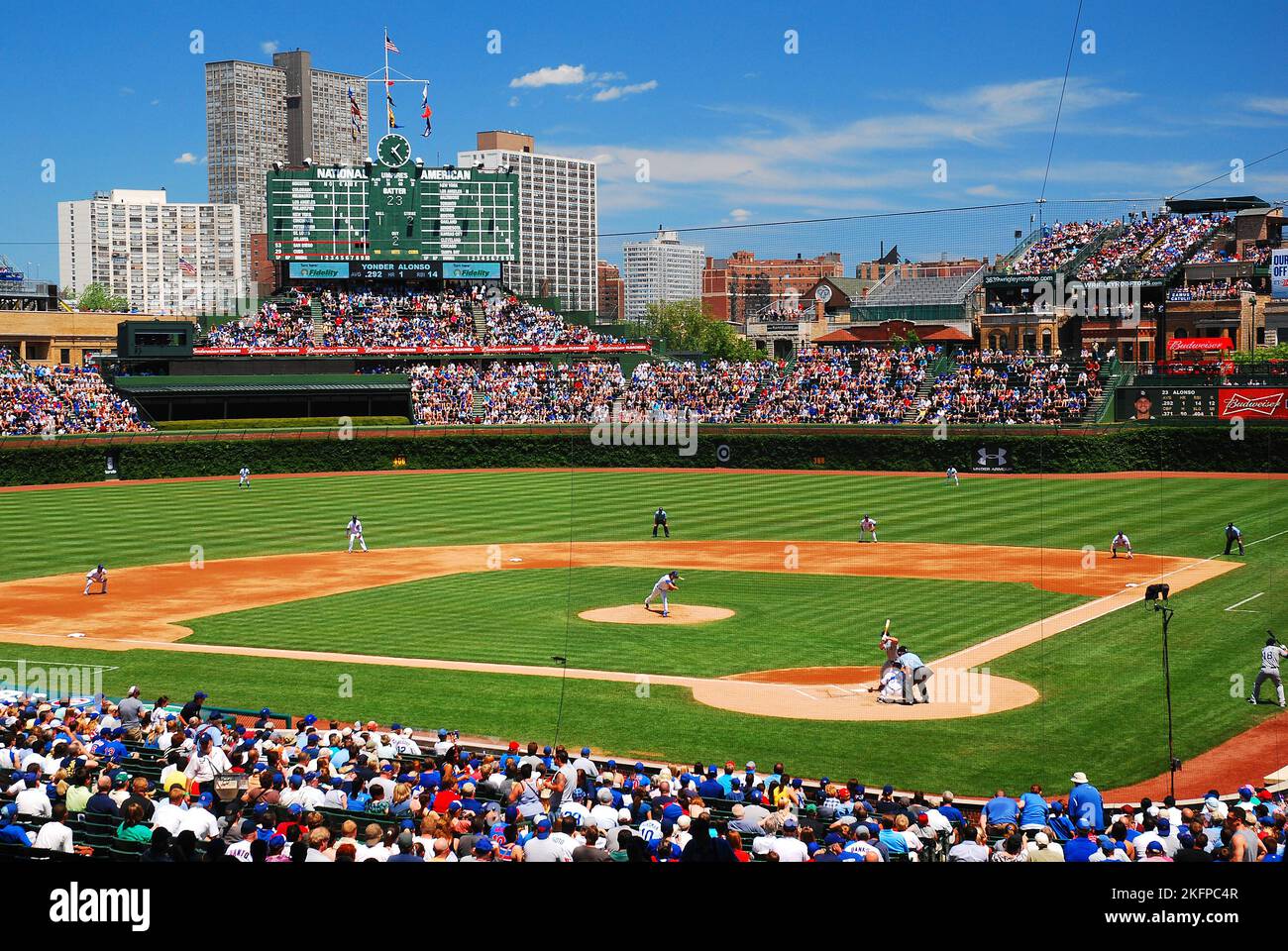 Fans enjoy a sunny summer day at the Friendly Confines of Wrigley Field To enjoy a Chicago Cubs baseball game Stock Photo