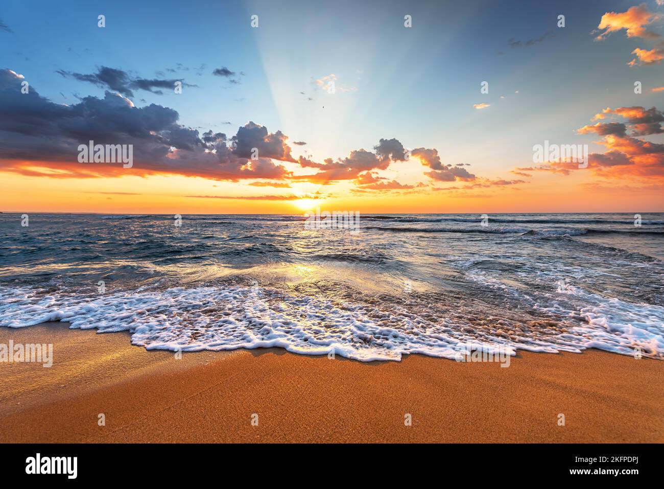 Beautiful cloudscape over the sea, sunrise shot Stock Photo - Alamy