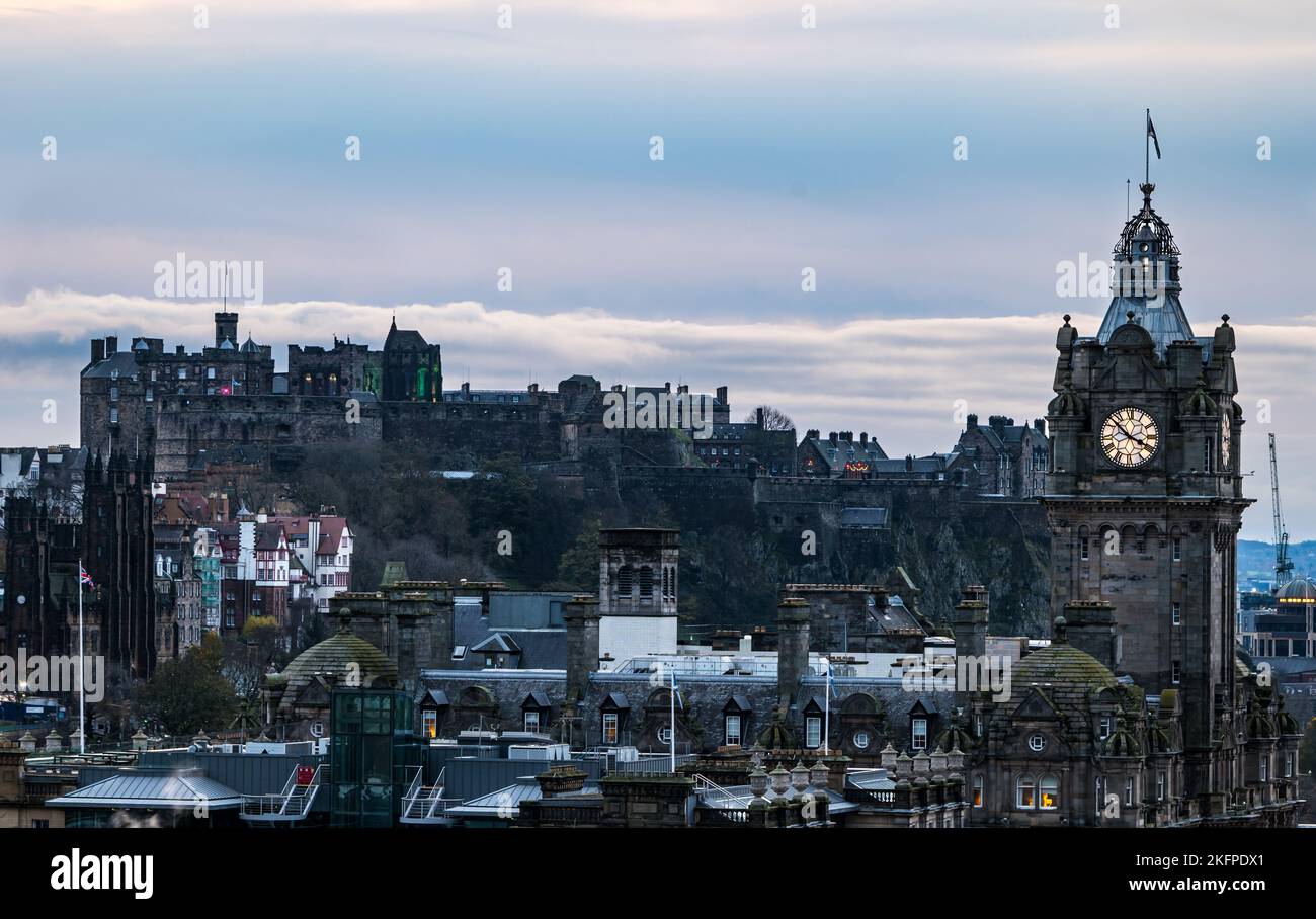 City centre skyline at twilight with Edinburgh castle and Balmoral Hotel clock tower, Scotland, UK Stock Photo