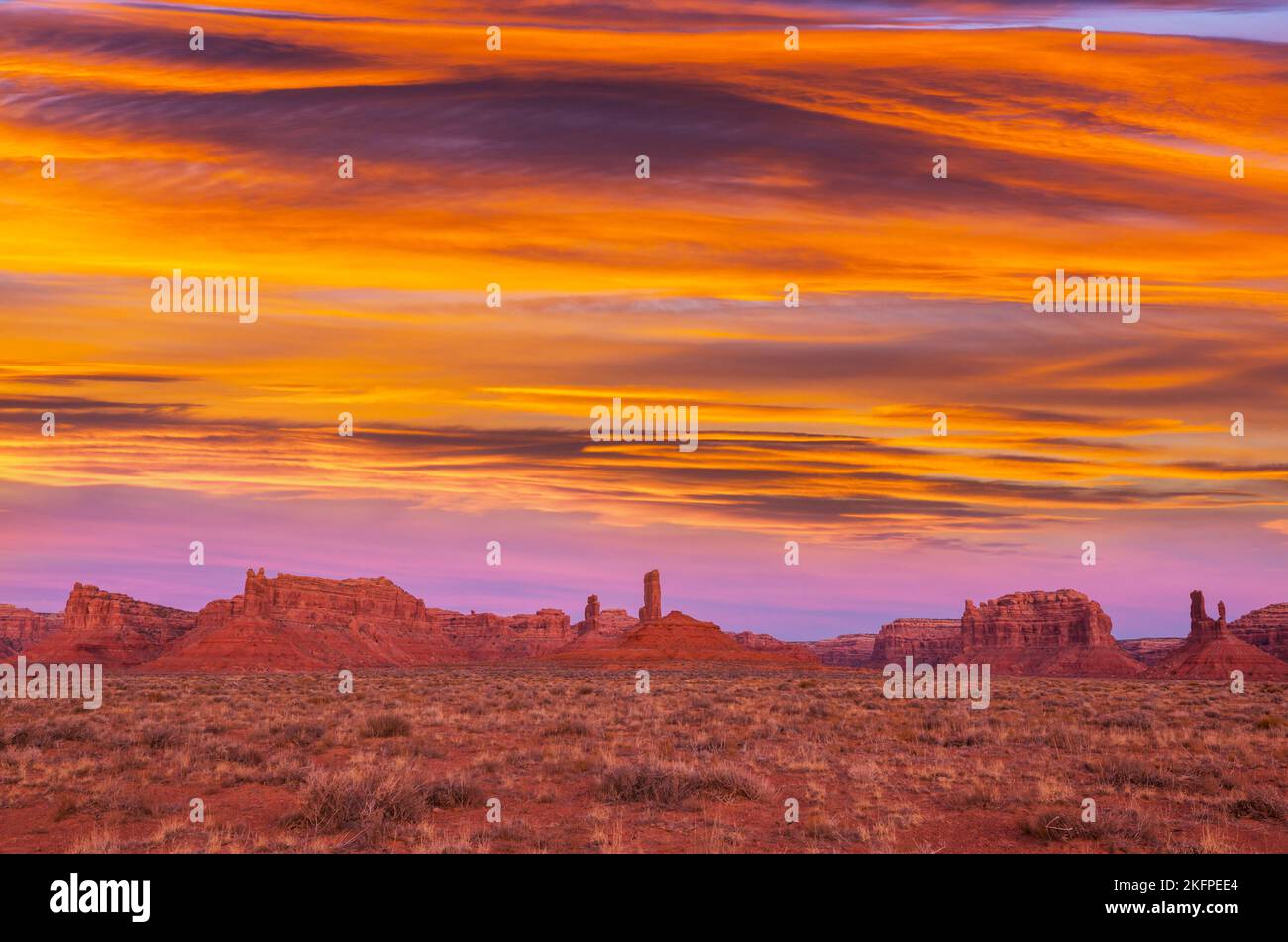 Valley Of The Gods Rock Formation With Monument Valley At Sunrise Stock