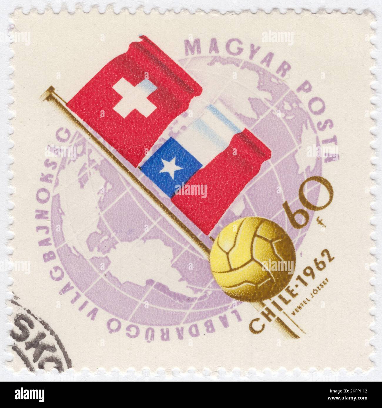 HUNGARY - 1962 May 21: An 60 forints pale lilac and bister postage stamp depicting Globe, Soccer Ball and Flags of Switzerland and Chile. Flags in National  Colors. World Cup Soccer Championship, Chile, May 30...June 17. A total of 56 teams entered the 1962 FIFA World Cup qualification rounds, competing for a total of 16 spots in the final tournament. Chile, as the hosts, and Brazil, as the defending champions, qualified automatically, leaving 14 spots open for competition Stock Photo