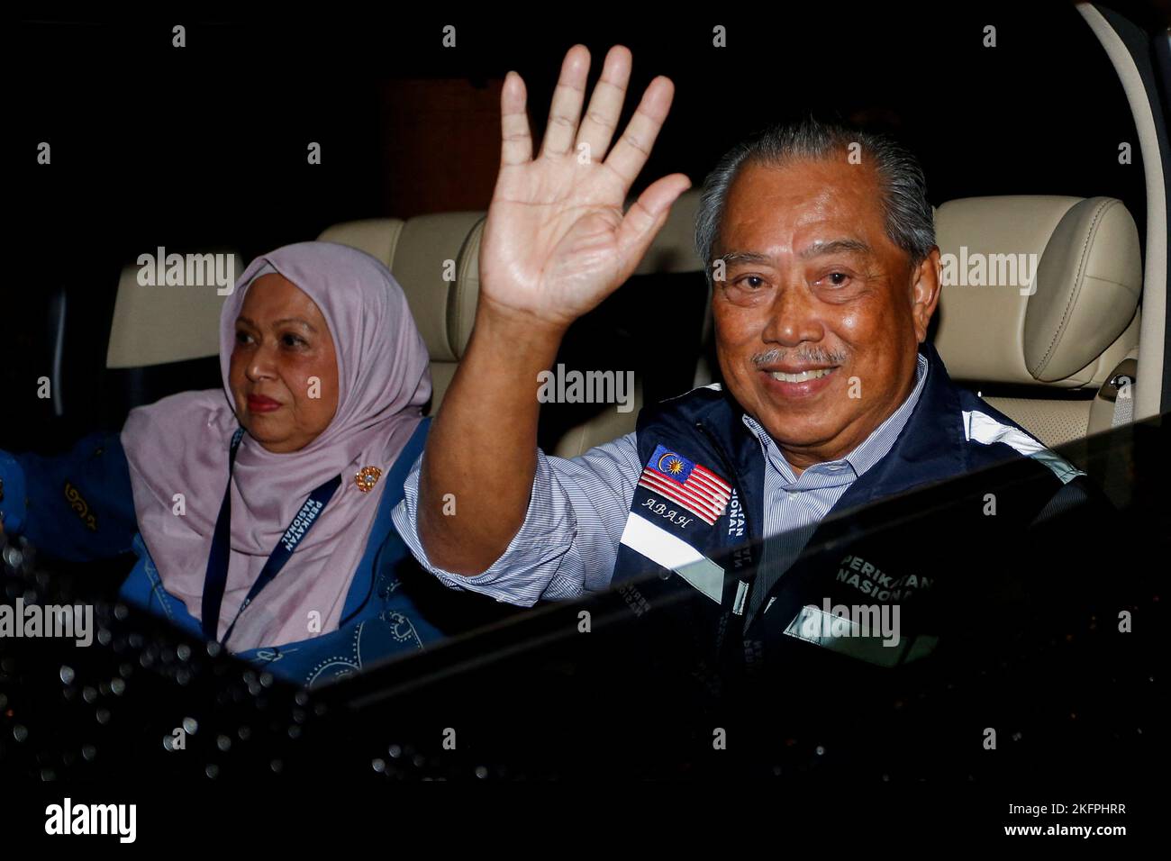 Malaysian former Prime Minister and Perikatan Nasional Chairman Muhyiddin Yassin waves as he leaves after Malaysia's 15th general election in Shah Alam, Malaysia November 20, 2022. REUTERS/Lai Seng Sin Stock Photo
