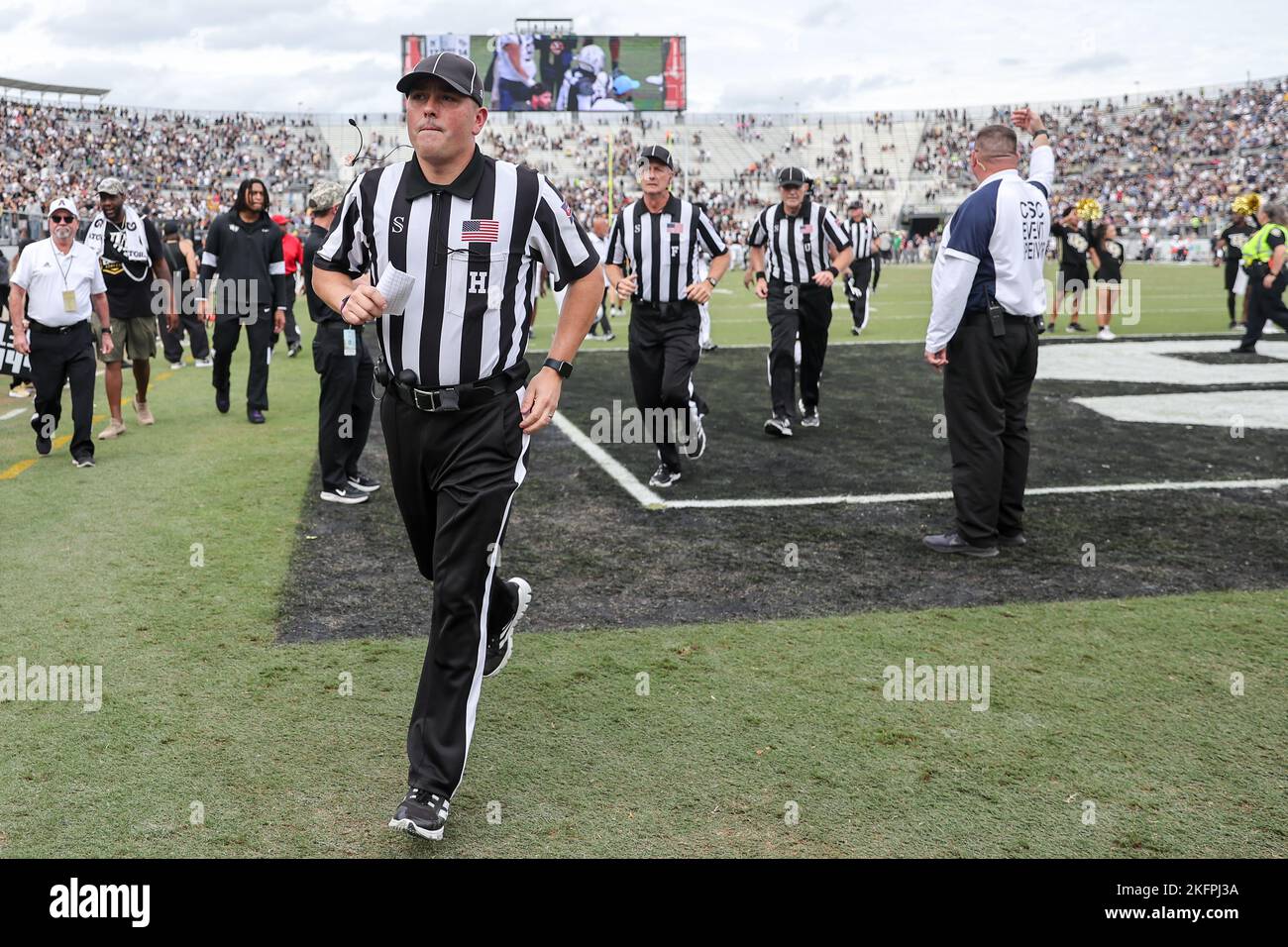 November 19, 2022: Game officials exit the field during the University of Central Florida Knights and the Navy Midshipmen NCAA football game at FBC Mortgage Stadium in Orlando, FL on November 19, 2022. (Credit Image: © Cory Knowlton/ZUMA Press Wire) Stock Photo