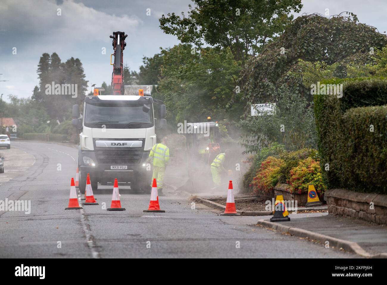 Repairs on a pavement in the Scottish market town of Lockerbie, Dumfries and Galloway, UK Stock Photo