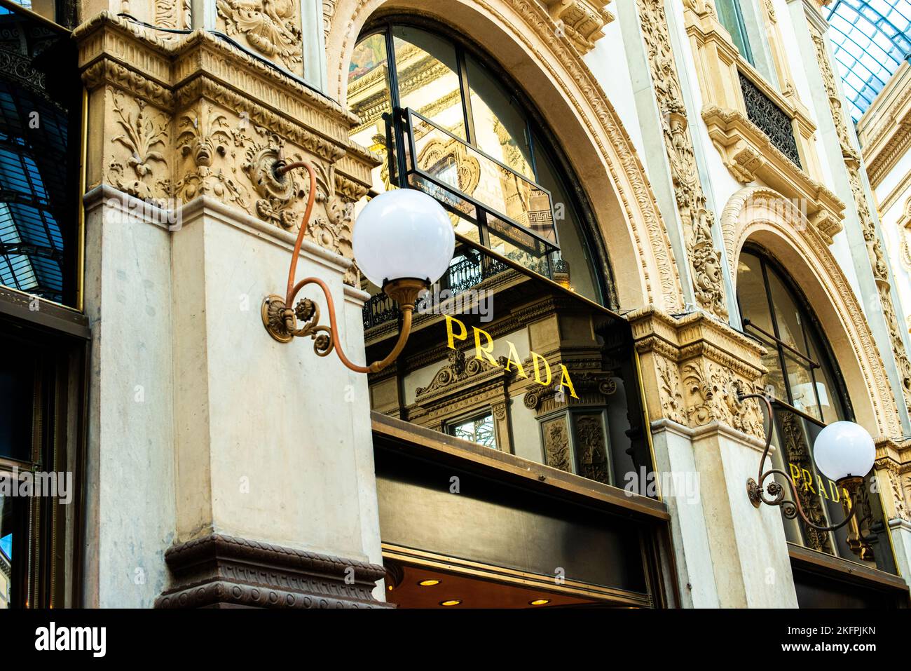 Milan, Italy, 20 December 2018:  Prada Store in Galleria Vittorio Emanuele II shopping mall in Milan, with shoppers and tourists strolling around. Pra Stock Photo