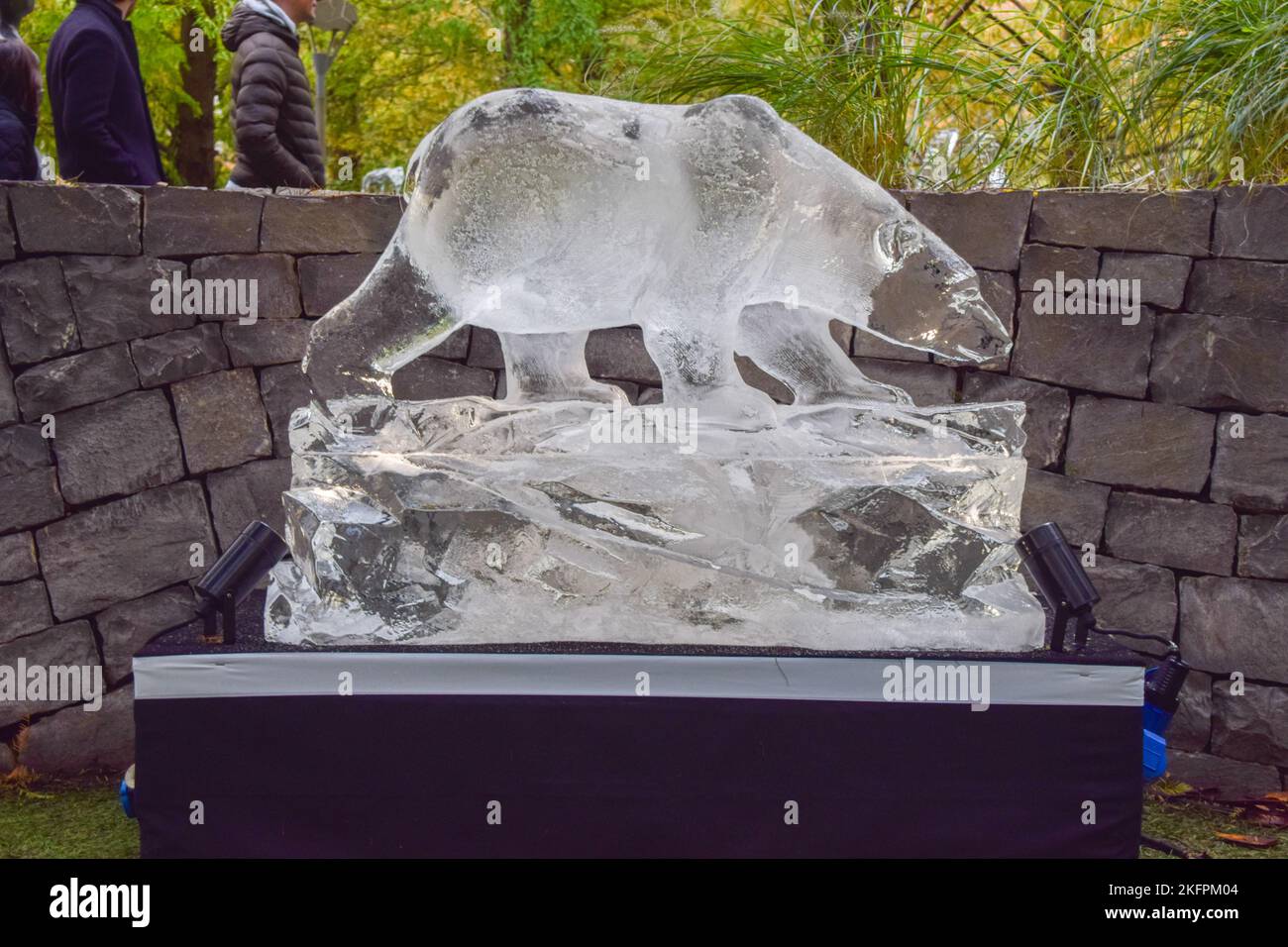London, UK. 19th November 2022. Polar bear ice sculpture. Sculptors