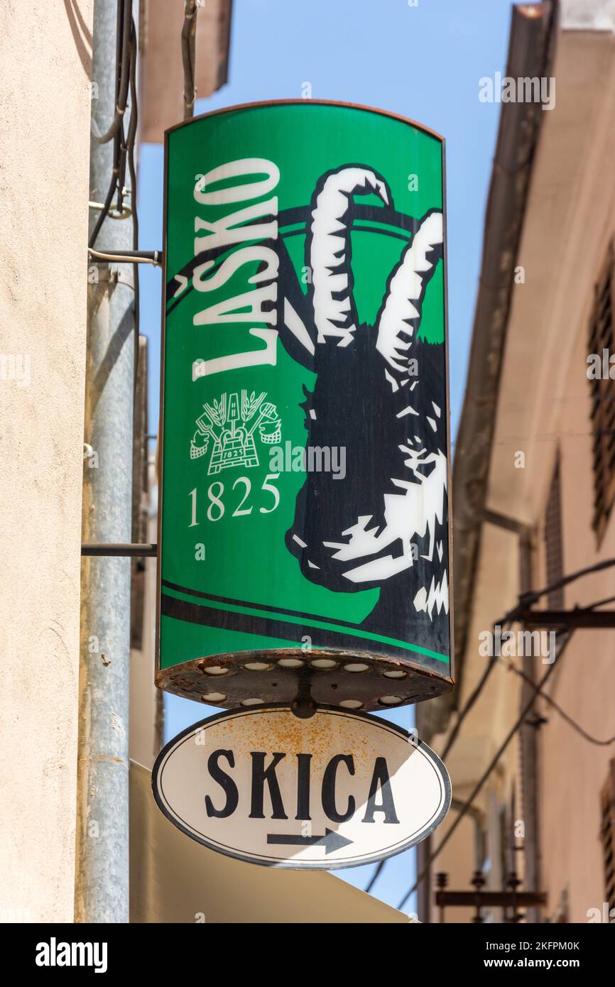 Lasko Beer advertising sign in Old Town, Čevljarska ulica, Koper, Slovene Istria, Slovenia Stock Photo