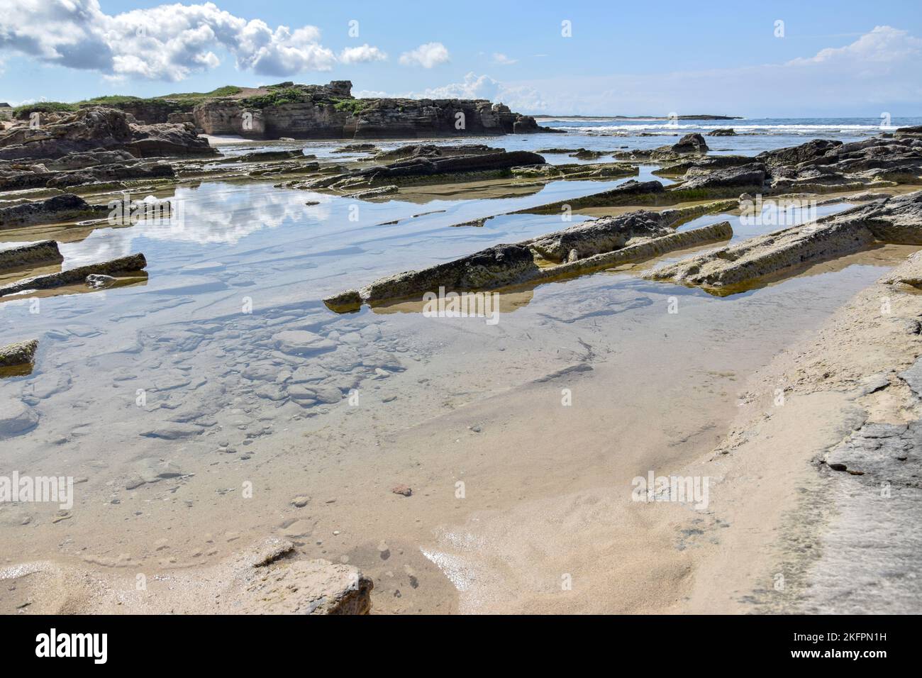 Outside Rocy A beautiful view of rocky seashore in Sardinia, Italy Stock Photo - Alamy