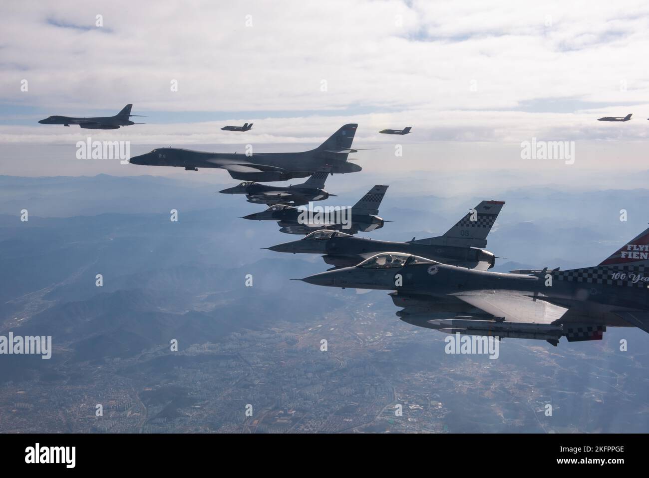 Korean Airspace, South Korea. 19th Nov, 2022. Two U.S. Air Force B-1B Lancer stealth strategic bomber aircraft, are escorted by U.S. Air Force F-16 fighter aircraft and South Korean F-35A stealth fighters during a formation flight in the Korean Air Defense Identification Zone, November 19, 2022, over South Korea. The show of force flight is in response to multiple North Korean missile launches. Credit: SrA Megan Estrada/U.S. Air Force Photo/Alamy Live News Stock Photo