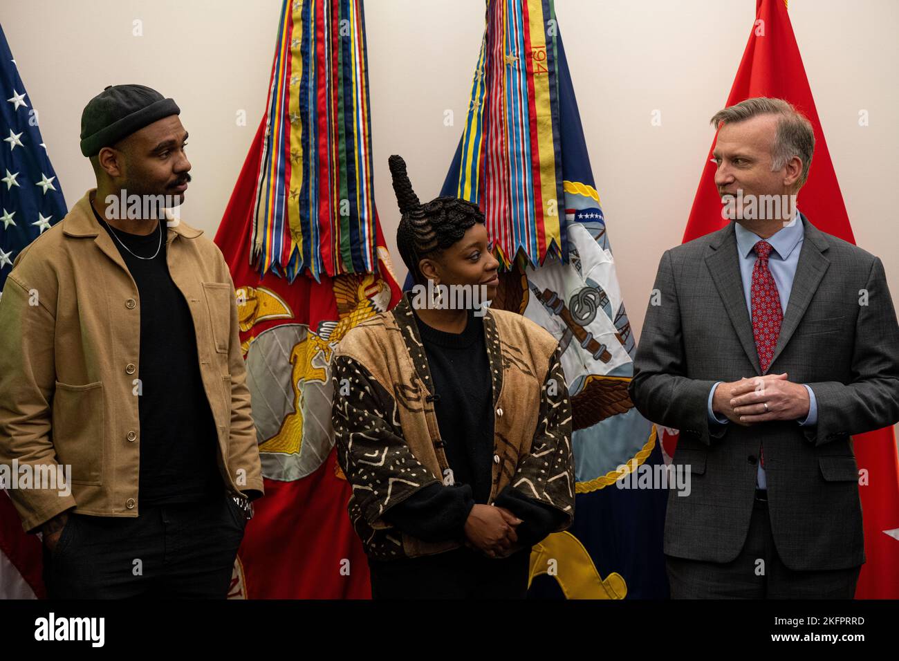 Arlington, United States Of America. 18th Nov, 2022. Arlington, United States of America. 18 November, 2022. American film director J.D. Dillard, left, and actor Christina Jackson, center, discuss their movie, 'Devotion' with Under Secretary of the Navy Erik Raven, right, following a tour of the Pentagon November 18, 2022 in Washington, DC The 2022 film is an American biographical war drama about elite fighter pilots during the Korean War. Credit: PO2 Alexander Kubitza/DOD/Alamy Live News Stock Photo